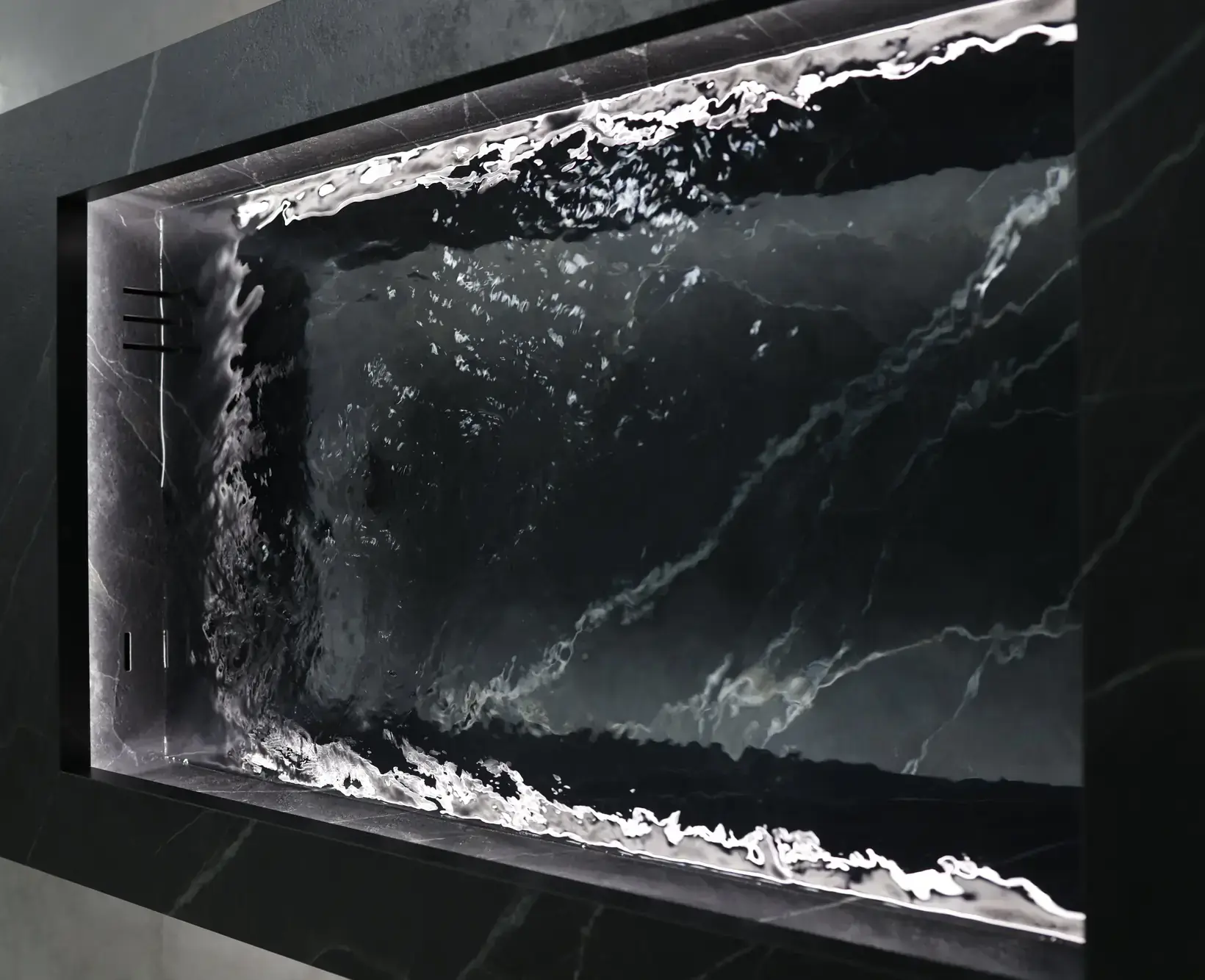 Completed Nordic Vitality cold plunge in dark marble with circulating water